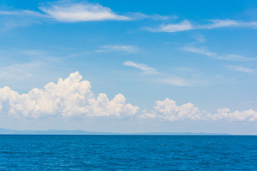 Naklejka na ściany i meble Idyllic perfect blue sky seascape with cloud