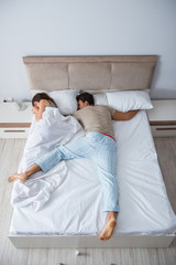 Woman and man in the bedroom