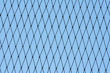 Pattern of seamless mesh nylon on blue sky background