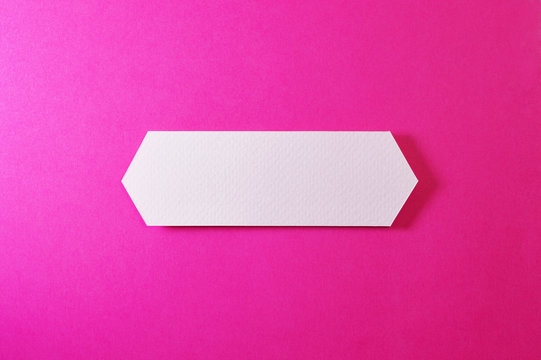 double arrow banner on pink background