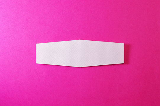 hexagonal banner on pink background