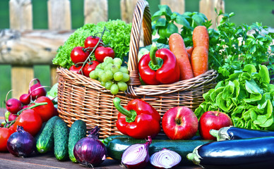 Variety of fresh organic vegetables in wicker basket