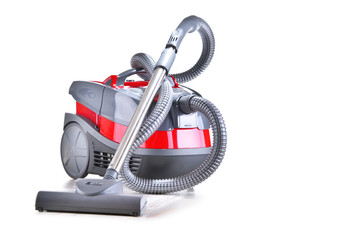 Canister vacuum cleaner for home use isolated on white
