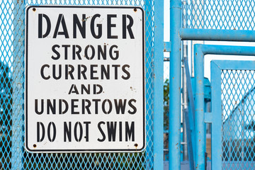 Do not swim sign warning of strong currents and undertows