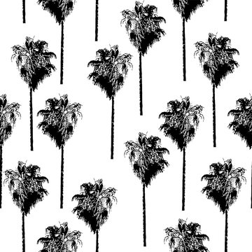 Palm trees seamless vector pattern. Retro-inspired. Black on a white background.