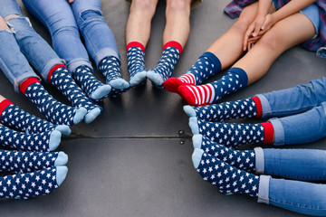Group wearing patriotic American flag style socks 