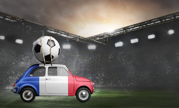 France flag on car delivering soccer or football ball at stadium