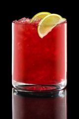 Cherry beam cocktail in Rocks glass isolated on black