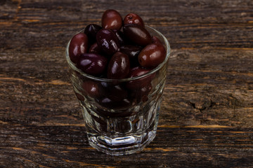 Black olives in the glass