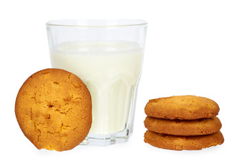 Glass of milk and homemade cookies with hand isolated on white background