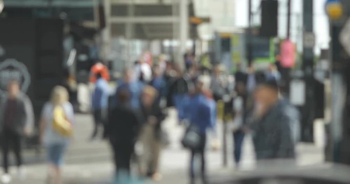 Blurred background of city pedestrians