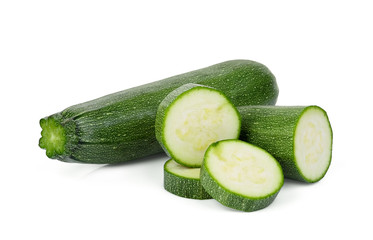 fresh green zucchini with slices isolated on white background