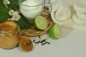 Bath-day ingredients for spa treatments soap with milk, honey, citrus and cloves, square.