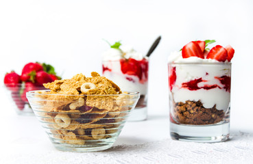 Strawberry parfait and cereals for healthy breakfast