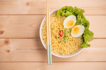 Asian noodles with vegetables and boiled egg