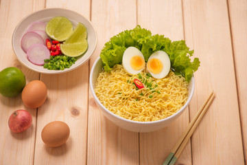 Asian noodles with vegetables and boiled egg