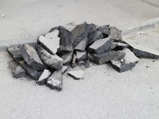 pieces of asphalt on the ground