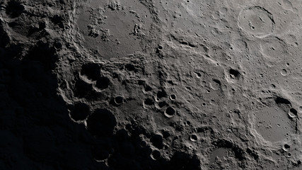 Fototapeta premium Craters in the surface of the Moon. Elements of this image furnished by NASA's Scientific Visualization Studio.