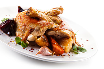 Grilled drumsticks with baked potatoes white background