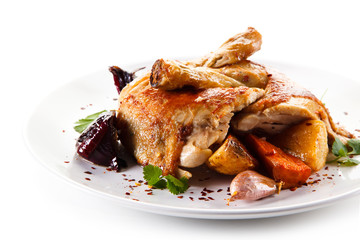 Grilled drumsticks with baked potatoes white background