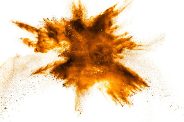 abstract orange powder explosion on  white background. abstract orange dust splattered on clear...