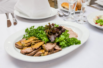meat sliced on a table
