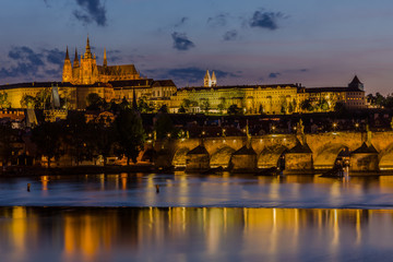 Sunset in Prague. Prague Castle and Charles Bridge in the sunner evening