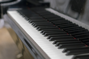 Piano keys close-up, selected focus. Close up view of black piano keys , selected focus.