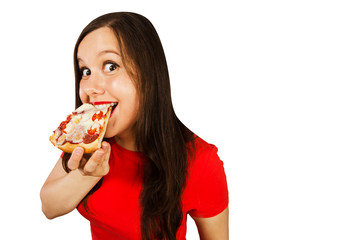 Young beautiful woman eats pizza and smiles, isolated on white background.