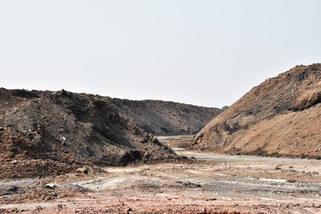 The many big mound after rain. Background is the sky.