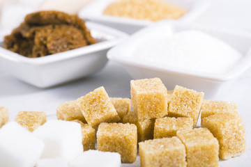 sugar variation on white wood table background