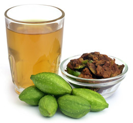 Green Triphala fruits with extract