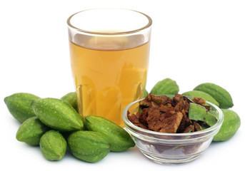Green Triphala fruits with extract