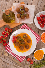 Meatballs with carrot purée.