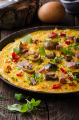 Fresh omelette, pickles mushrooms and chilli