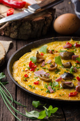 Fresh omelette, pickles mushrooms and chilli