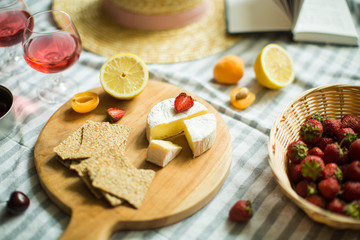 summer picnic in nature, fruit, berries, cheese