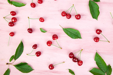 Ripe cherry berries and cherry  leaf