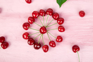 Ripe cherry berries and cherry  leaf