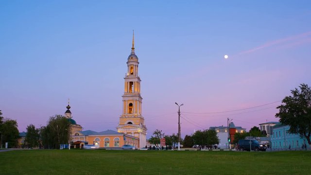 Kolomna, Russia. Sunset view of Kolomna, Russia at night with a cathedral and car traffic. Time-lapse of blue clear sky, moving moon