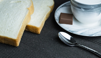 slice bread breakfast with chocolate and milk