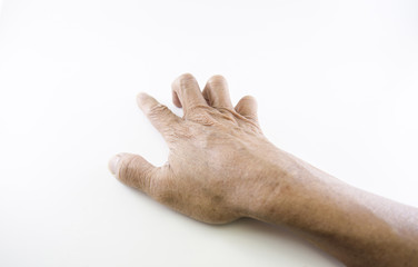 Hand and finger man is rough skin and wrinkles. Gesture on a whi