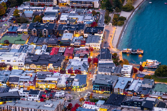 Long exposure photography, close-up, the traffic in Queenstown city during sunset time. © Klanarong Chitmung