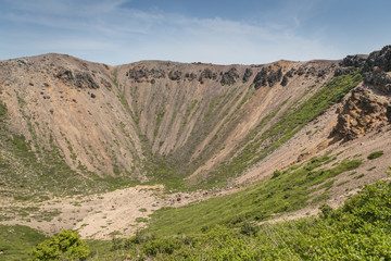 Azuma-Kofuji peak 1707 meters ,Mount Azuma is a roughly 2000 meter tall, volcanic mountain range northeast of Mount Bandai along the border of Fukushima and Yamagata Prefectures