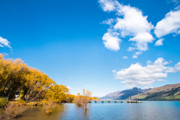 Beautiful landscape of Alps mountain and lake on a sunny day with blue sky.