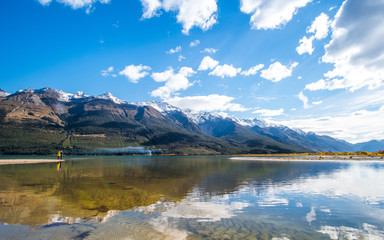 Beautiful landscape of Alps mountain and lake on a sunny day with blue sky.