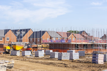 New build houses building construction site, Cheshire, England, UK - obrazy, fototapety, plakaty