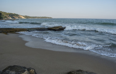 Beautiful view and waves on the beach in Varna, the sea capital of Bulgaria. What's better than sunny weather, sea and sight, waves and a nice company.