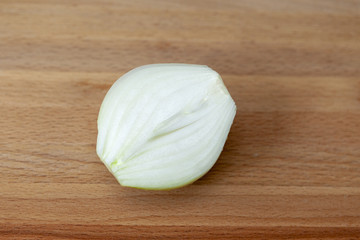 Fresh onion on a cutting board