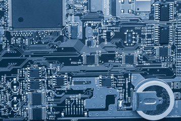 Electronic components are mounted on the device board Chips diodes capacitors chokes Close-up